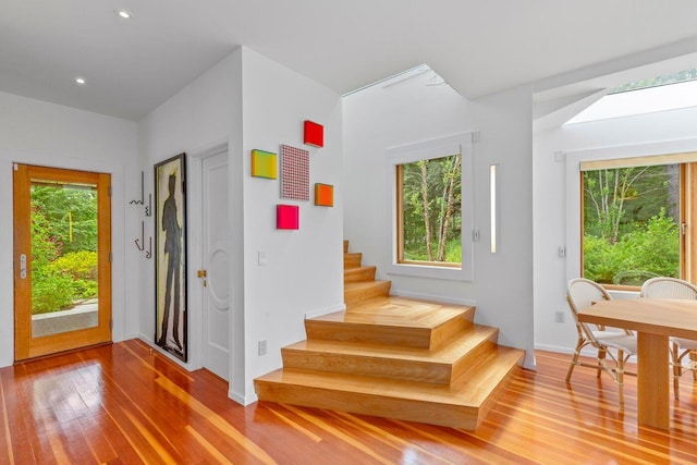 entryway with hardwood / wood-style flooring