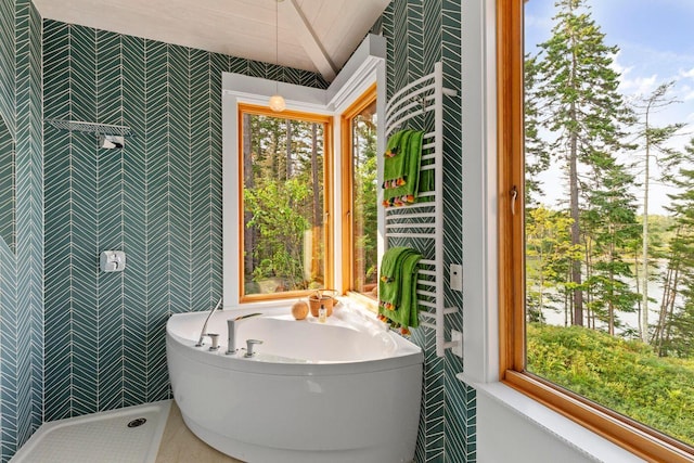 bathroom with tile walls