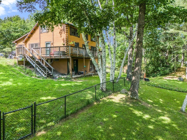 view of yard with a wooden deck