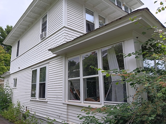 view of property exterior with cooling unit