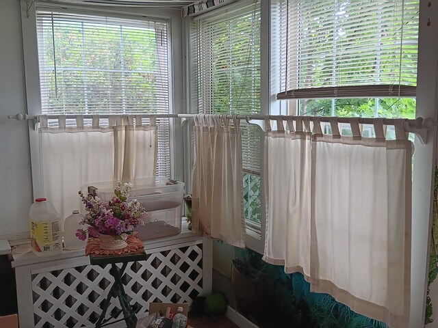 sunroom / solarium featuring a wealth of natural light