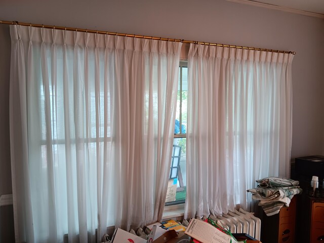 bedroom with ornamental molding