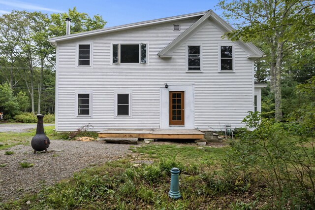 rear view of house with a deck