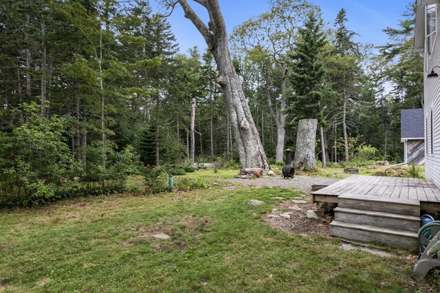 view of yard featuring a deck