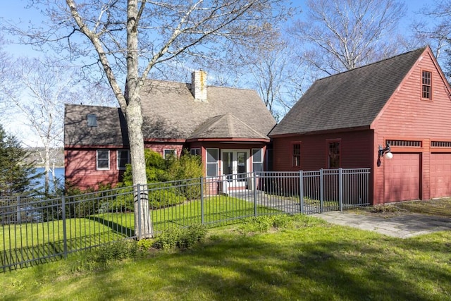 view of front of property featuring a front lawn and french doors