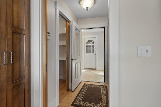 hallway featuring light hardwood / wood-style flooring