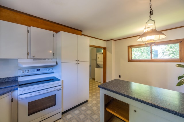 kitchen with pendant lighting, stacked washing maching and dryer, crown molding, white cabinetry, and electric stove