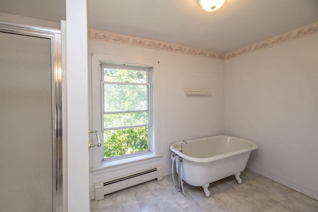 bathroom with a baseboard heating unit and separate shower and tub