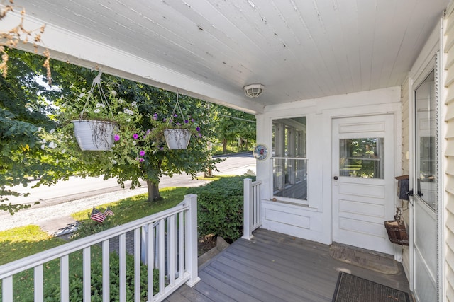 wooden deck featuring a porch