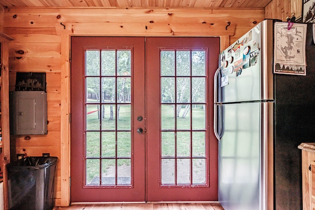 doorway featuring electric panel, french doors, and hardwood / wood-style floors