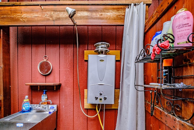 room details featuring water heater and sink