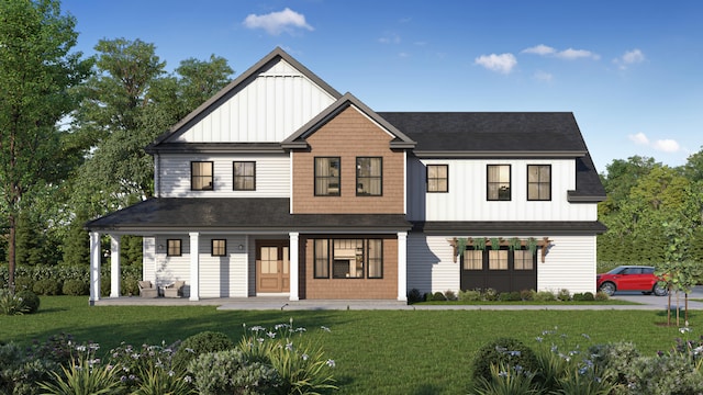 view of front of house with a porch and a front yard