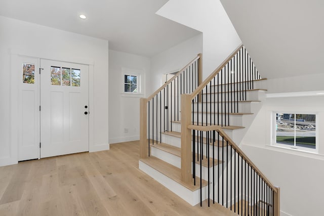 entryway with light hardwood / wood-style floors