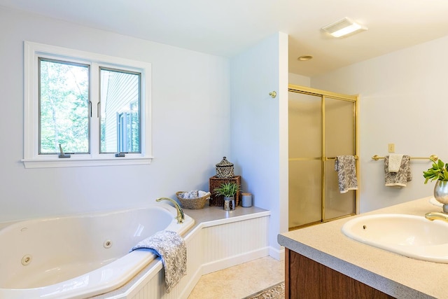 full bathroom featuring a jetted tub, a shower with shower door, and vanity