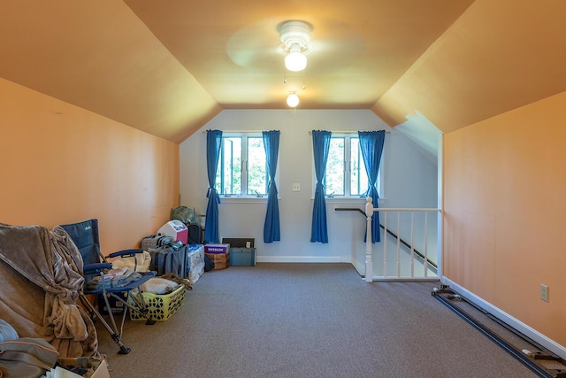 bonus room featuring a ceiling fan, carpet flooring, vaulted ceiling, and baseboards