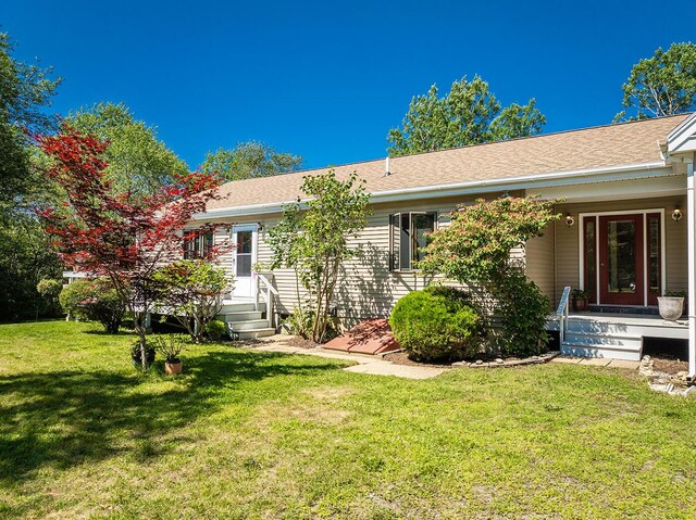 single story home with a front yard