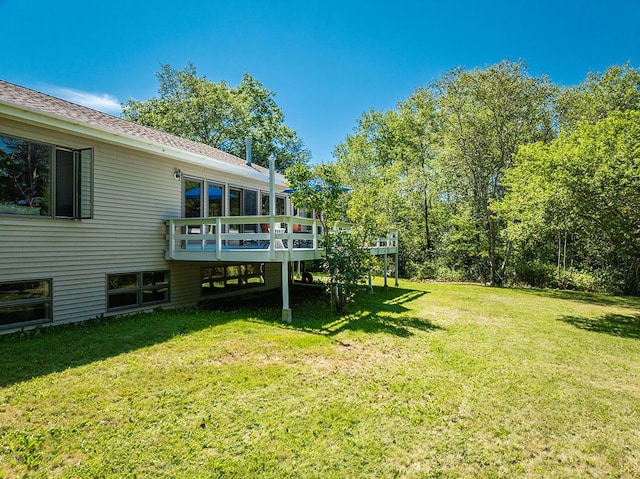 view of yard featuring a deck