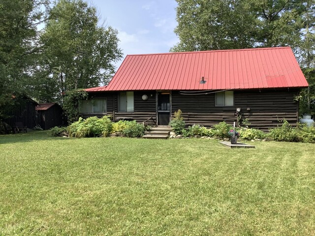 view of front of home with a front lawn