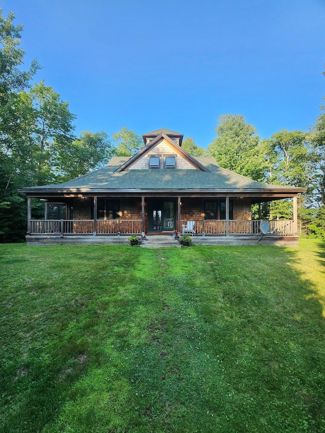 back of house featuring a lawn