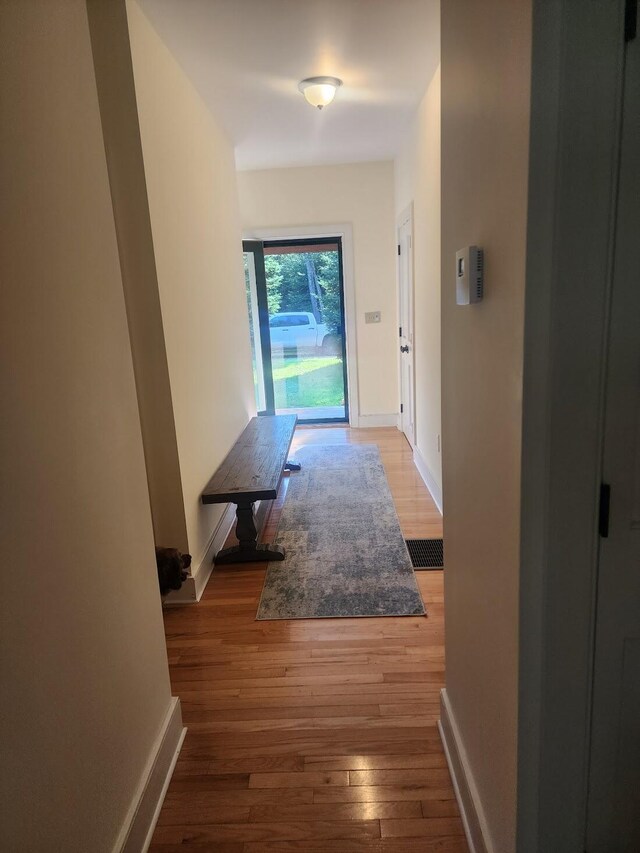 hall featuring hardwood / wood-style floors