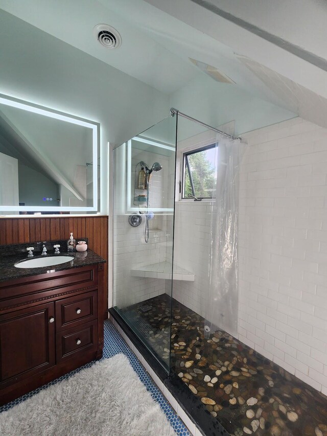 bathroom with vanity and a shower with shower curtain