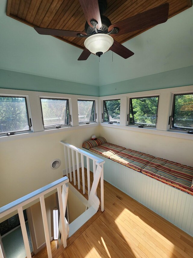 unfurnished bedroom featuring vaulted ceiling, wood ceiling, ceiling fan, and light hardwood / wood-style floors