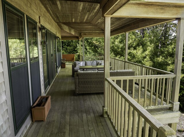 166 Kingfisher Trl, Perry, ME 04667 - wooden terrace with outdoor lounge area