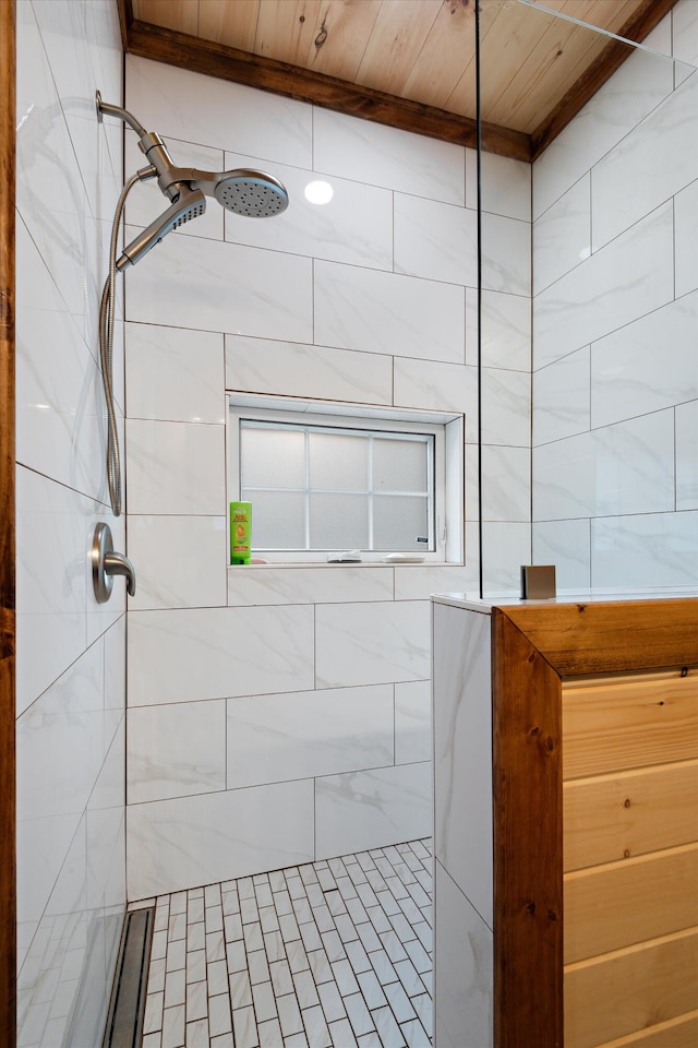 bathroom featuring wooden ceiling and a tile shower