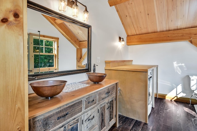 bathroom featuring wood-type flooring, vaulted ceiling with beams, vanity, and wood ceiling