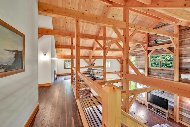 hall with vaulted ceiling with beams, wooden ceiling, and dark hardwood / wood-style floors