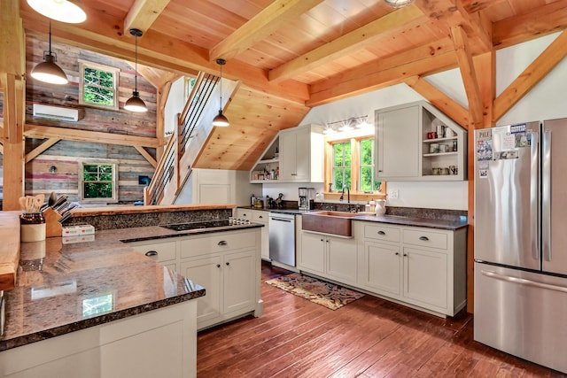 kitchen featuring sink, wood ceiling, stainless steel appliances, decorative light fixtures, and dark stone counters