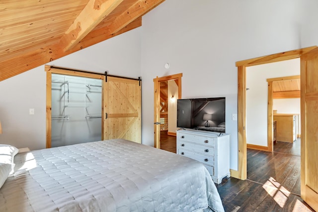 bedroom with a barn door, dark hardwood / wood-style floors, high vaulted ceiling, and beam ceiling