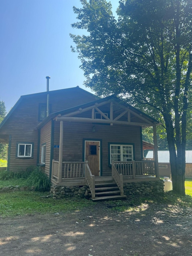 63 Rebel Hill Rd, Merrill, ME 04780 - view of front of home with covered porch