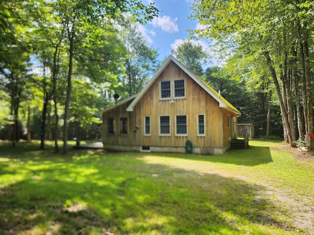 back of house with a yard