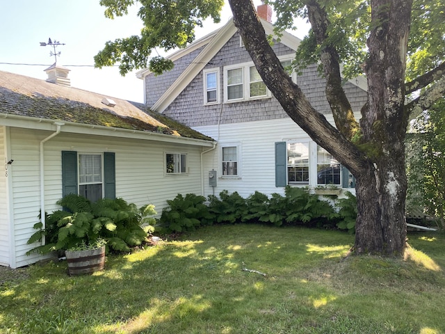 exterior space with a front lawn