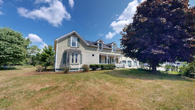 view of front of house with a front lawn