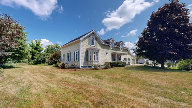 view of property exterior with a lawn