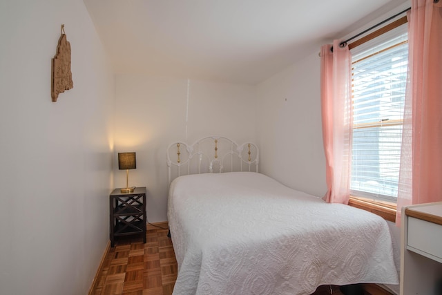 bedroom featuring multiple windows