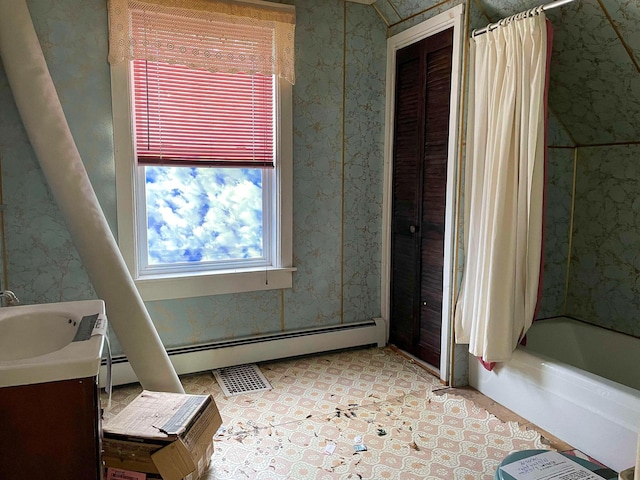 full bathroom featuring wallpapered walls, a baseboard heating unit, shower / bath combo with shower curtain, and vanity