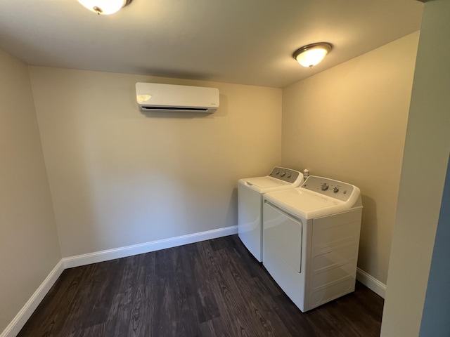 clothes washing area featuring separate washer and dryer, dark hardwood / wood-style flooring, and an AC wall unit