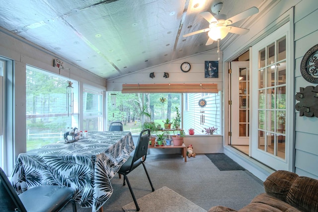 sunroom featuring ceiling fan and lofted ceiling