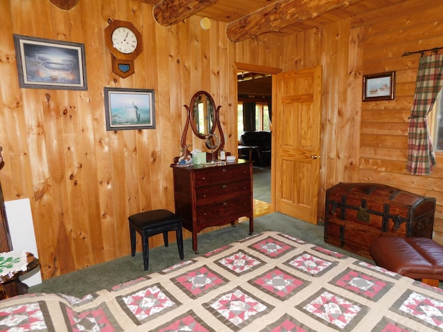 bedroom featuring wood walls, carpet floors, and beamed ceiling