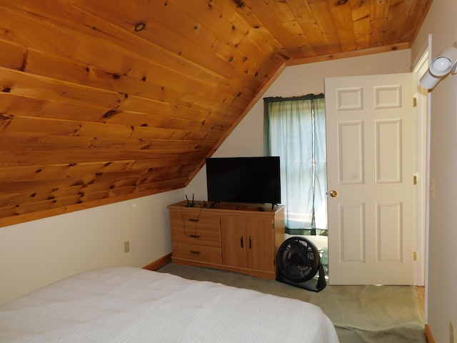 carpeted bedroom featuring wooden ceiling and vaulted ceiling