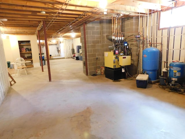61 Sawyer Pond Highlands, Greenville, ME 04441 - unfinished basement featuring a heating unit
