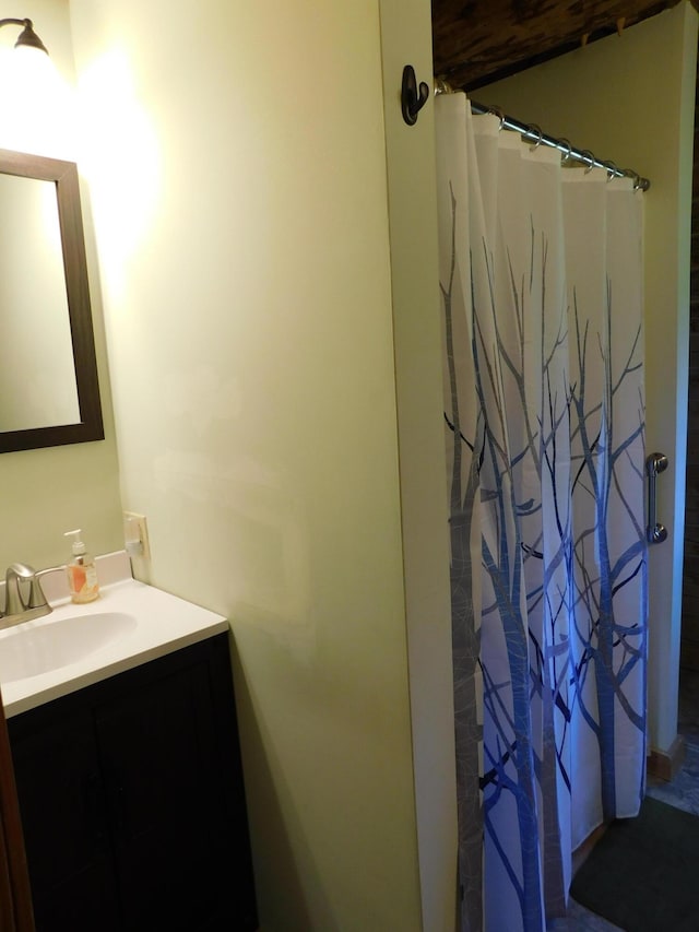 61 Sawyer Pond Highlands, Greenville, ME 04441 - bathroom featuring a shower with shower curtain and vanity