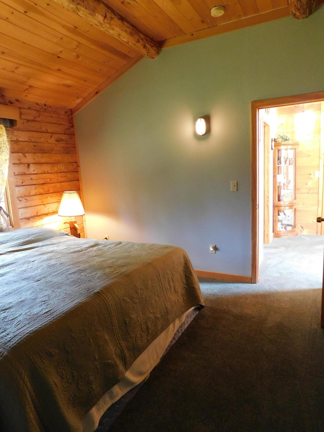 bedroom featuring lofted ceiling with beams, carpet flooring, and wood ceiling