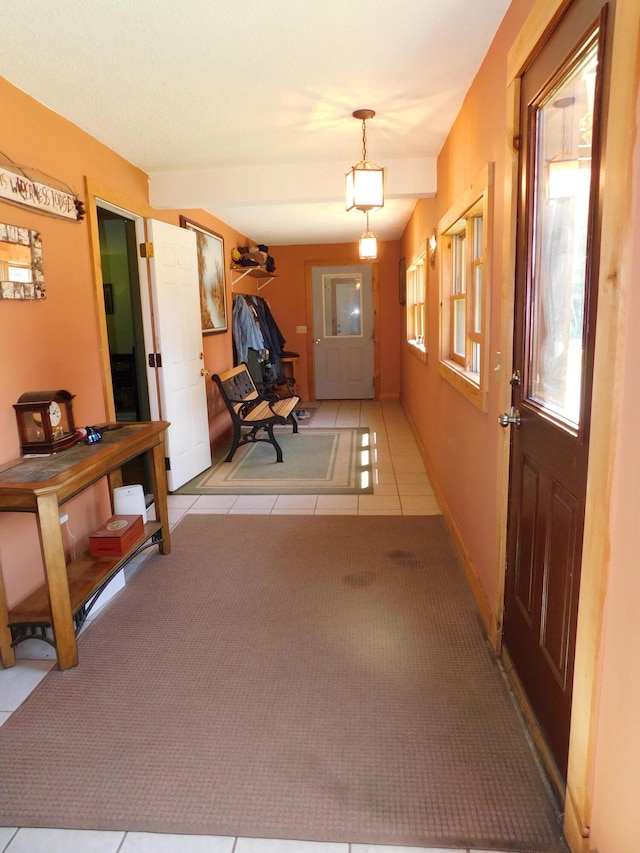 interior space with light tile patterned floors