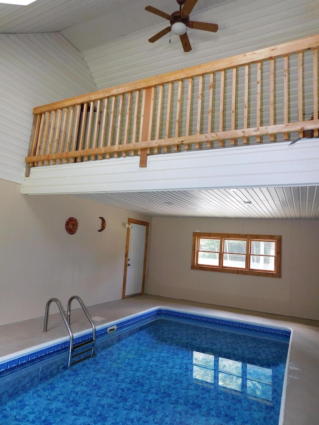 view of pool featuring ceiling fan