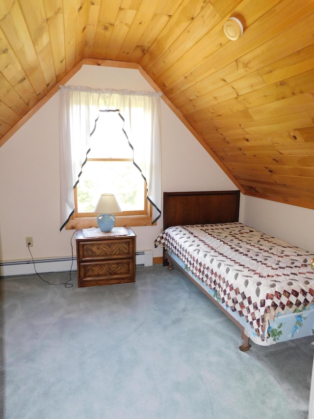 unfurnished bedroom featuring lofted ceiling, baseboard heating, and carpet flooring