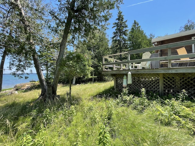 45 Maple Leaf Dr, Gouldsboro, ME 04607 - view of yard featuring a deck with water view